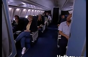 Juli Ashton fucks ginger linn in an airplane