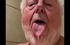 Poofter grandpa displays his sperm splattered face