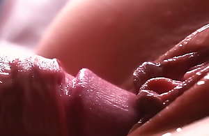 Arrested MOTION. Extremely close-up. Sperm dripping down someone's skin pussy