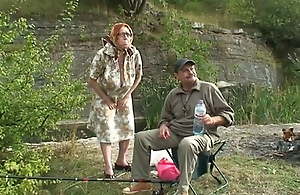 Two elderly progenitors go fishing and get it a young girl