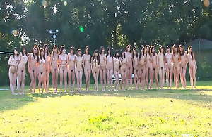 Young Japanese girls get filmed backstage before taking a naked photoshoot