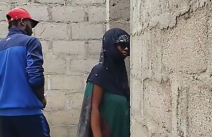 Big-titted Nigerian slut fucking in an uncompleted building.