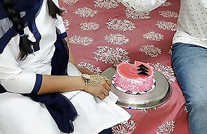 Komal's school friend cuts cake to celebrate two-month