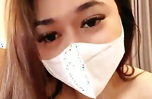 Newfangled Indonesia Viral girl crippling a mask is masturbating herself